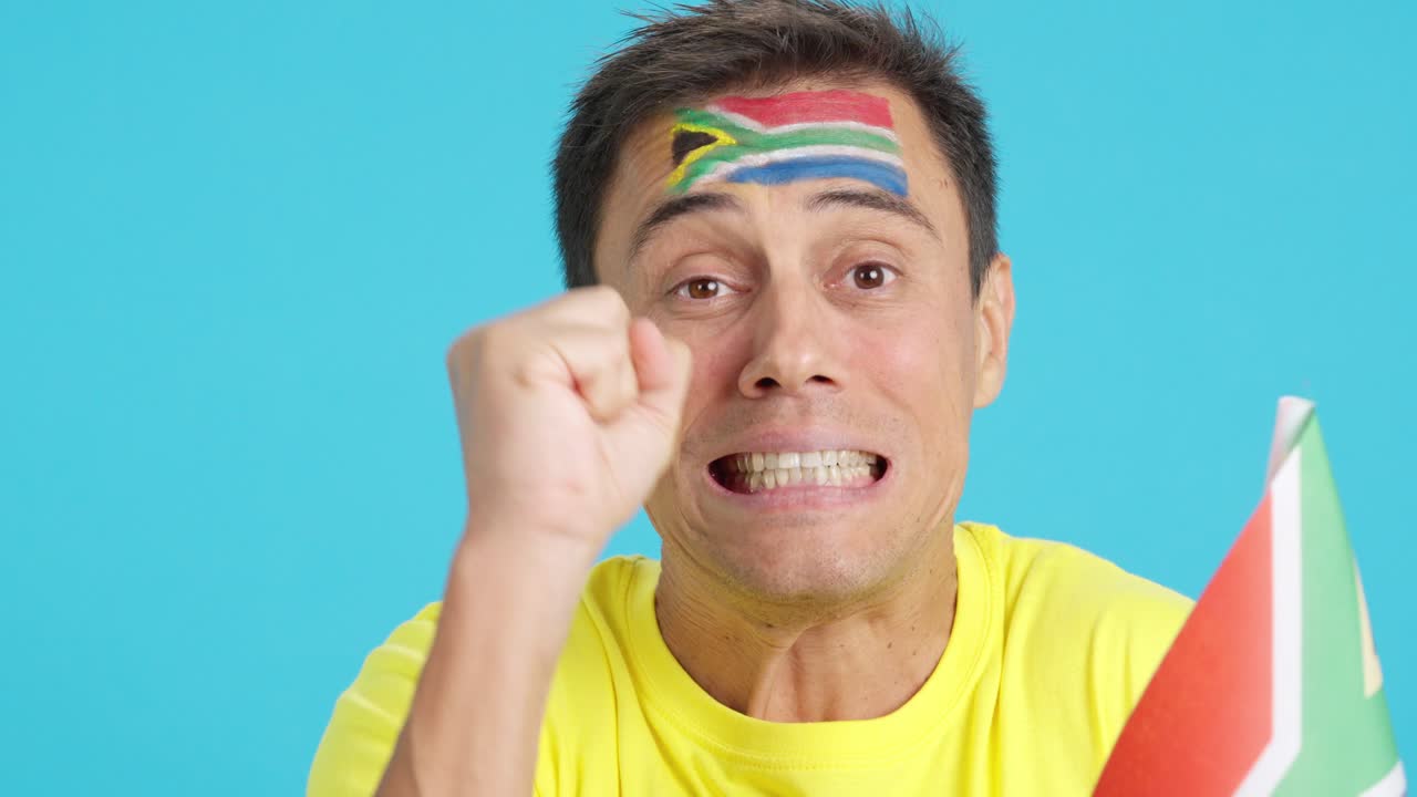 Very nervous man supporting south african team during a difficult match