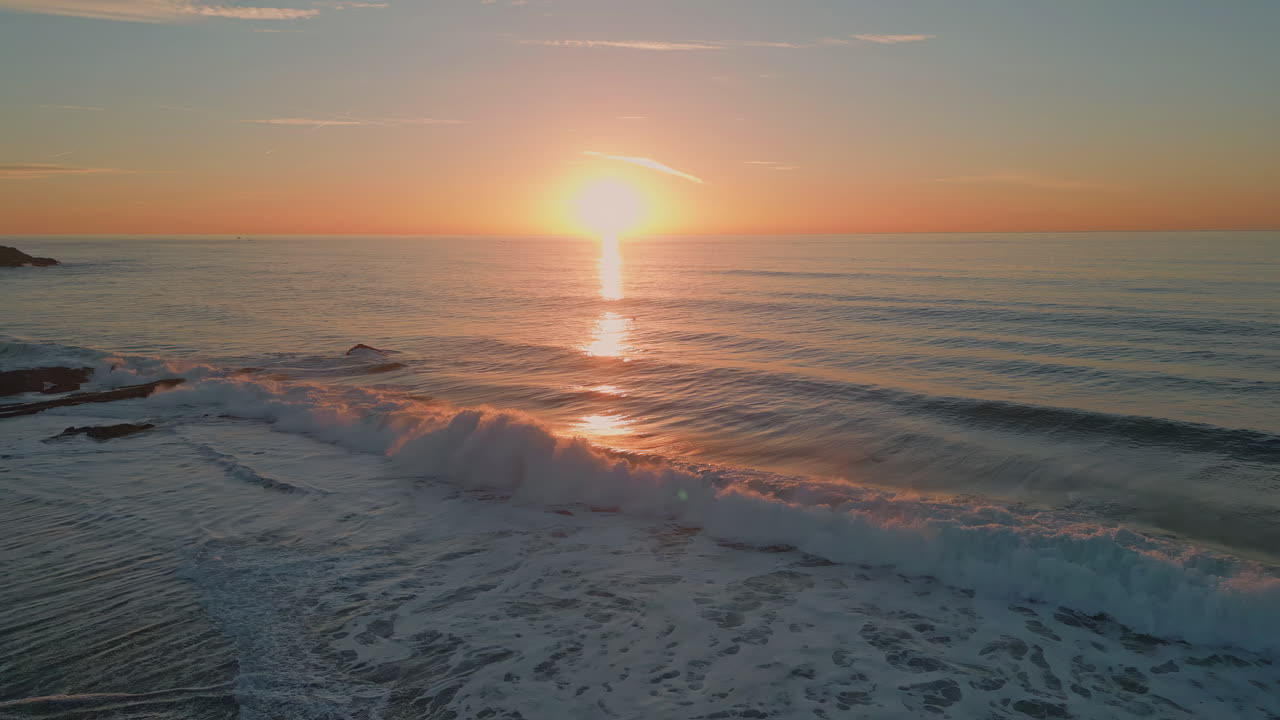 Aerial view sunset horizon romantic coastline evening blue sky. Orange sunrise
