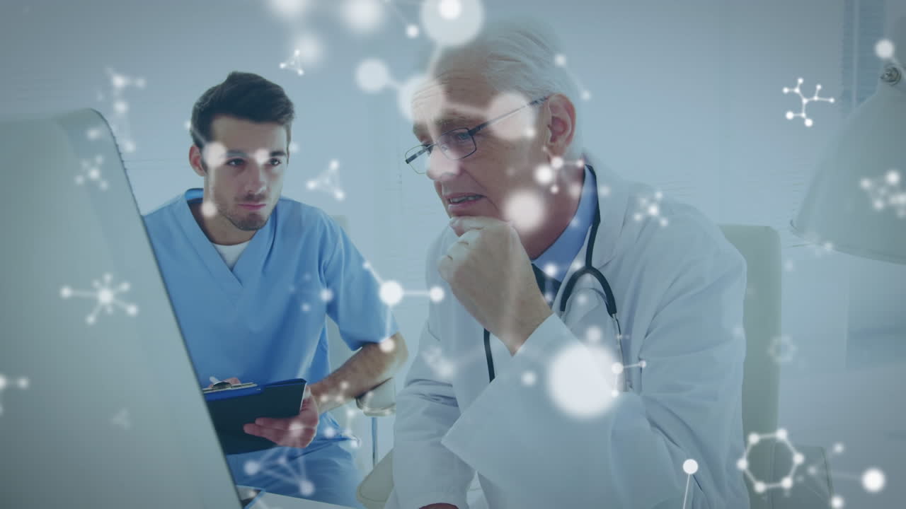 백인 남성 의사와 환자 위에 떨어지는 분자의 애니메이션