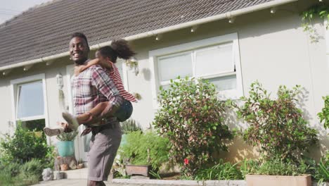 african american father and daughter spending time together