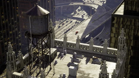 urban rooftop view overlooking busy highway and city landscape during daytime