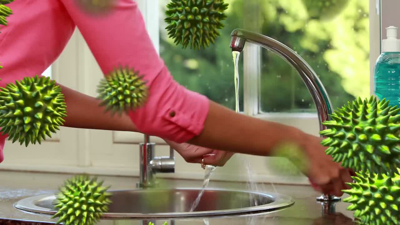 animación de células de macro coronavirus covid-19 que se propagan sobre una mujer lavándose las manos