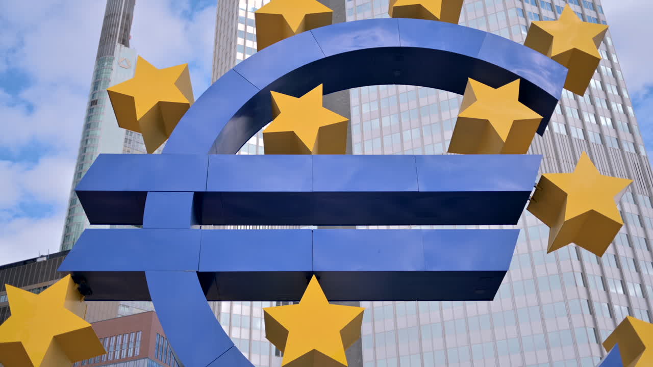 Euro Symbol in Frankfurt with Ukraine Protest Banner