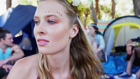 woman having glass of beer at music festival 4k