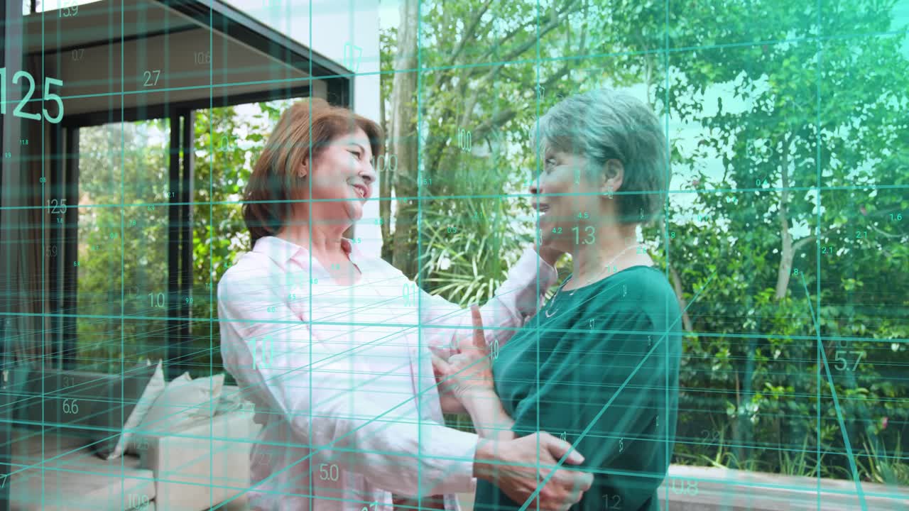 Two women placing hand on chest, embracing on deck, showing care, digital grid overlaying for tech