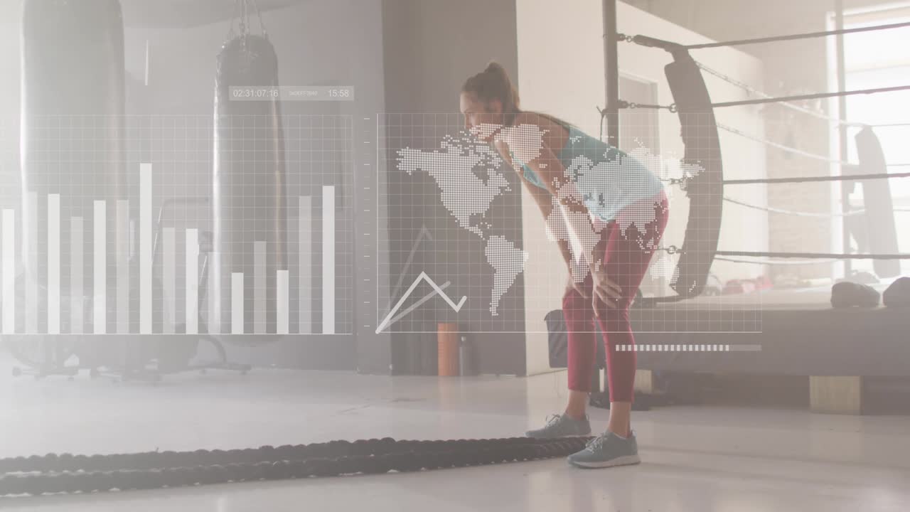 Woman gripping and swinging battle ropes, ramping amplitude while analytics charting metrics, map