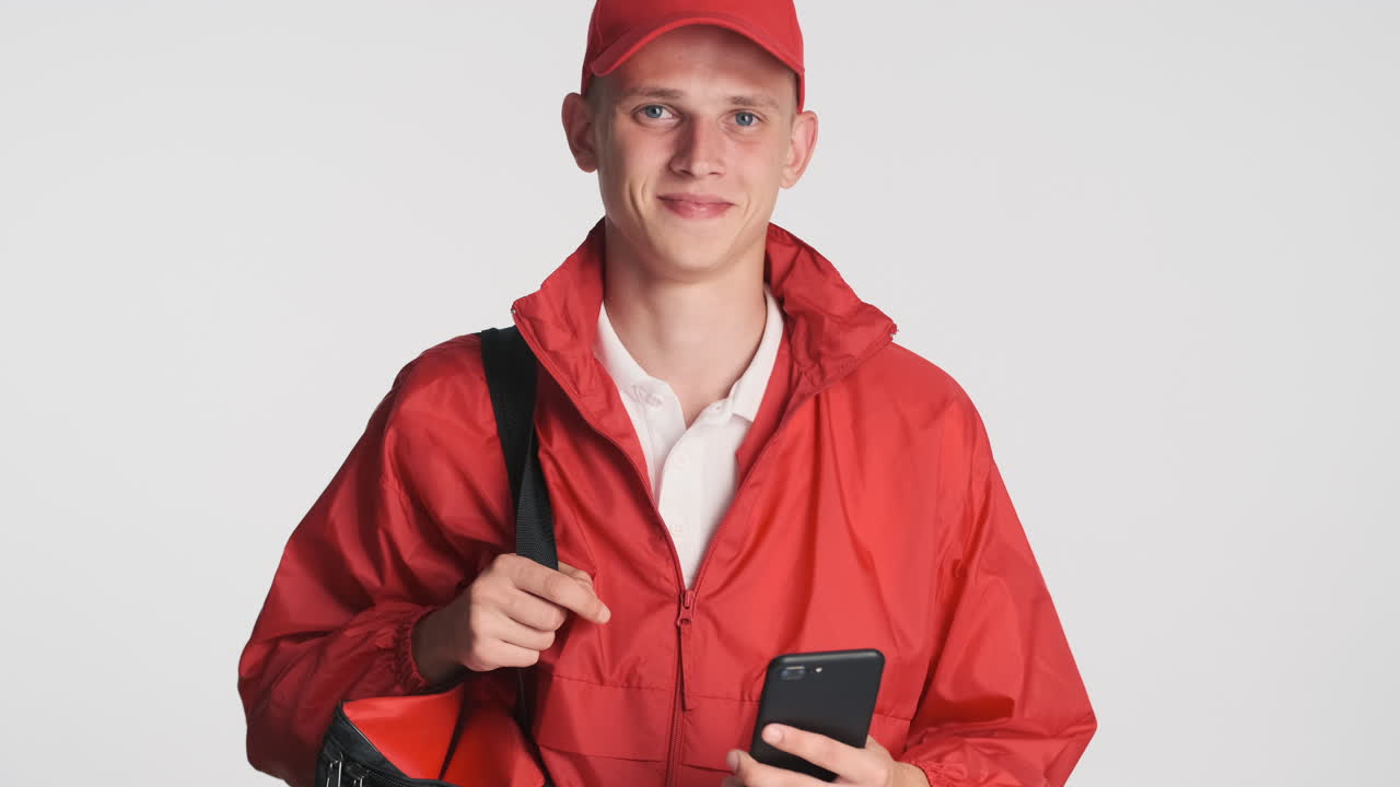 Delivery man using smartphone