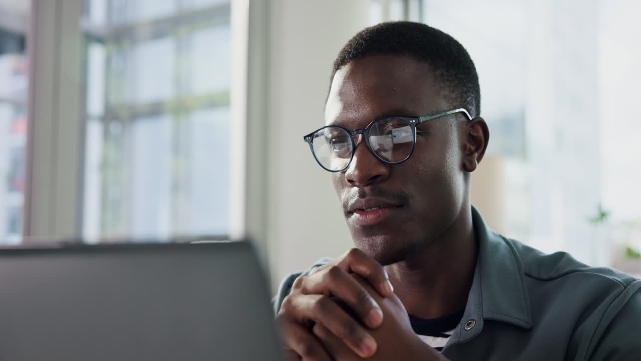 Man working on computer in office