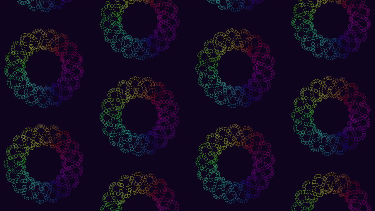 A vibrant array of rainbow circles set against a black backdrop forming a visually appealing pattern that can serve as a website background or design accent