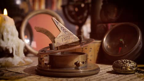 vintage style travel and adventure. vintage old compass and other vintage items on the table.