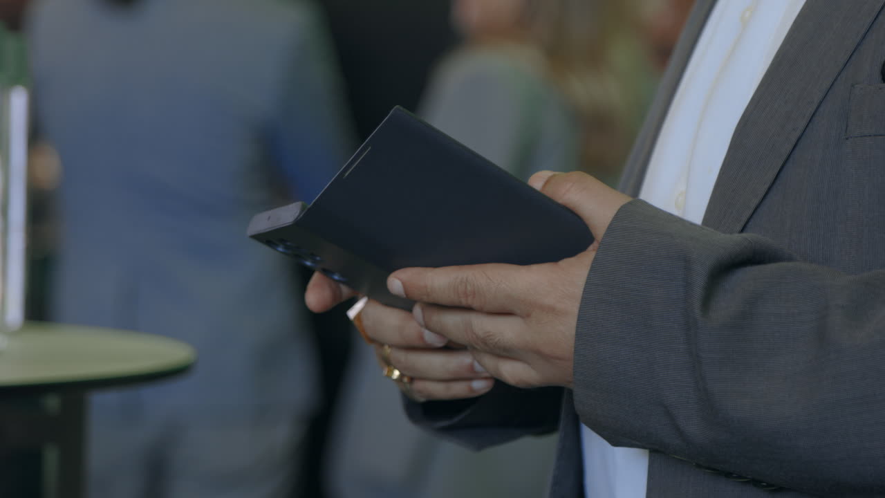 Man holding a foldable phone