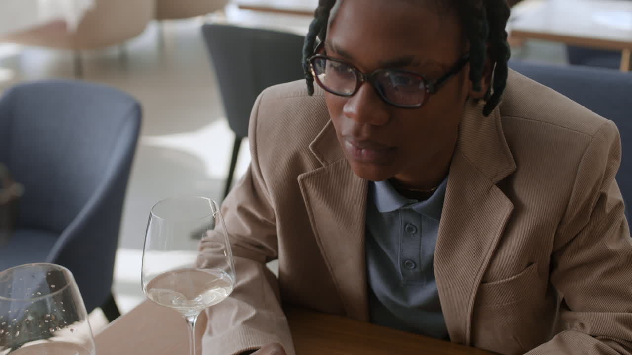 Person Dining at a Restaurant