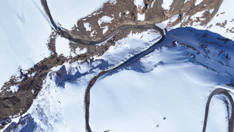 snowy mountain pass road