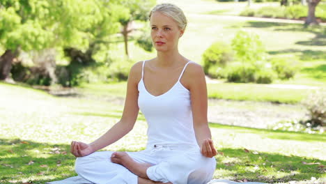 A-woman-maintaining-her-yoga-position