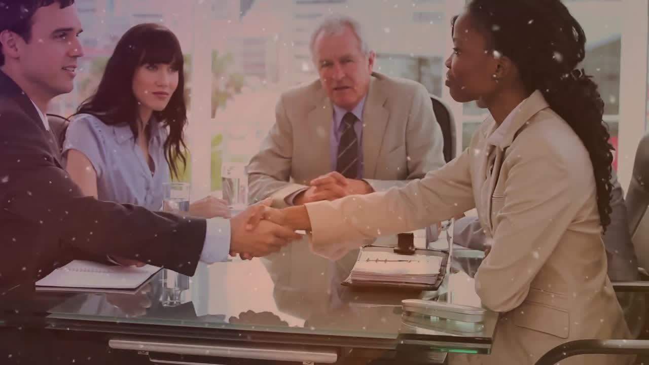 Animation of glowing spots over business people in meeting