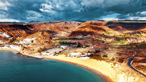 rugged cliffs and sandy beaches of gran canaria's coast