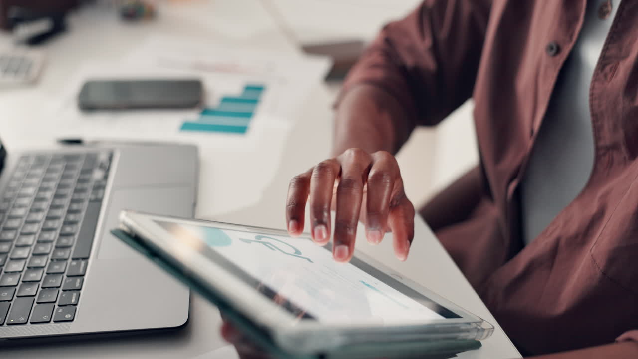 Working at a desk with technology