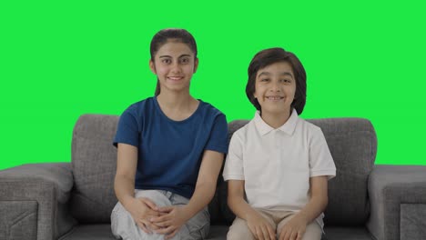 Happy-Indian-cousin-smiling-to-the-camera-Green-screen