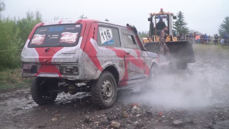 off-road vehicle competition in muddy terrain