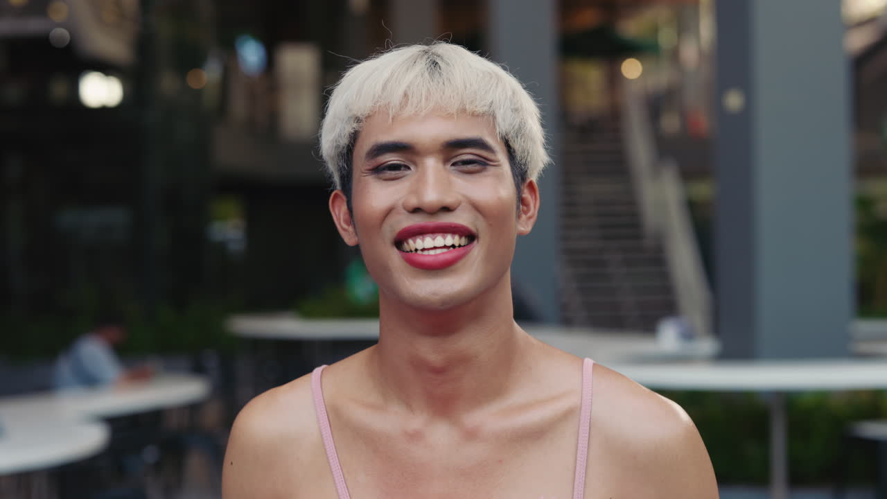 Smiling Person in Pink Dress