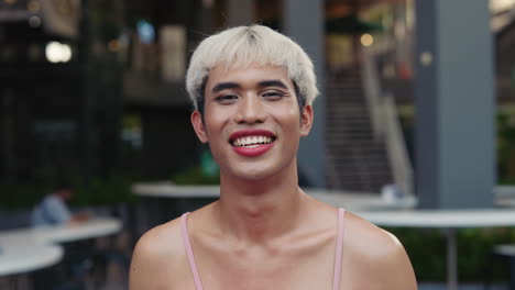 smiling person in pink dress