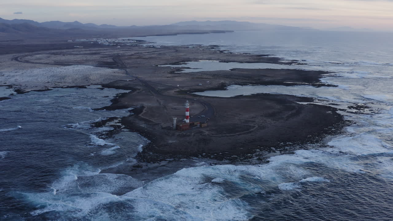Aerial View of Lighthouse on Coastal Peninsula