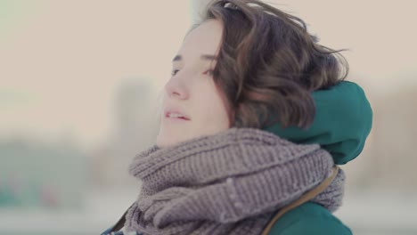 woman taking a photo in winter