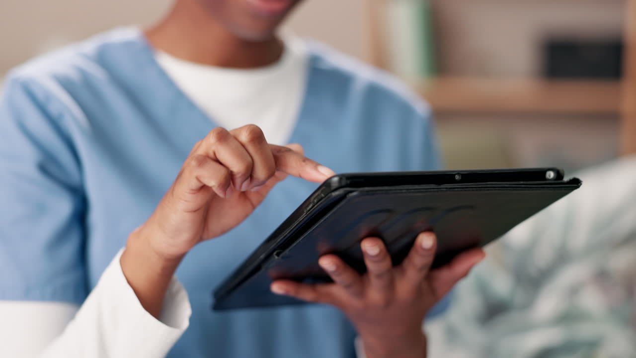 Medical professional using a tablet