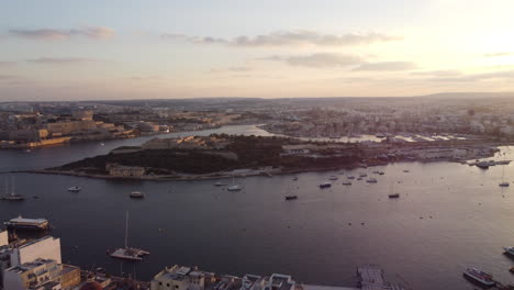 4k-Drone-footage-of-Valletta-harbor-in-the-morning,-Malta