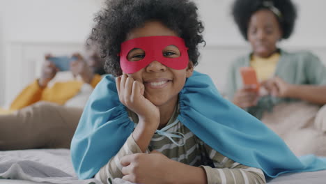 adorable child in superhero costume