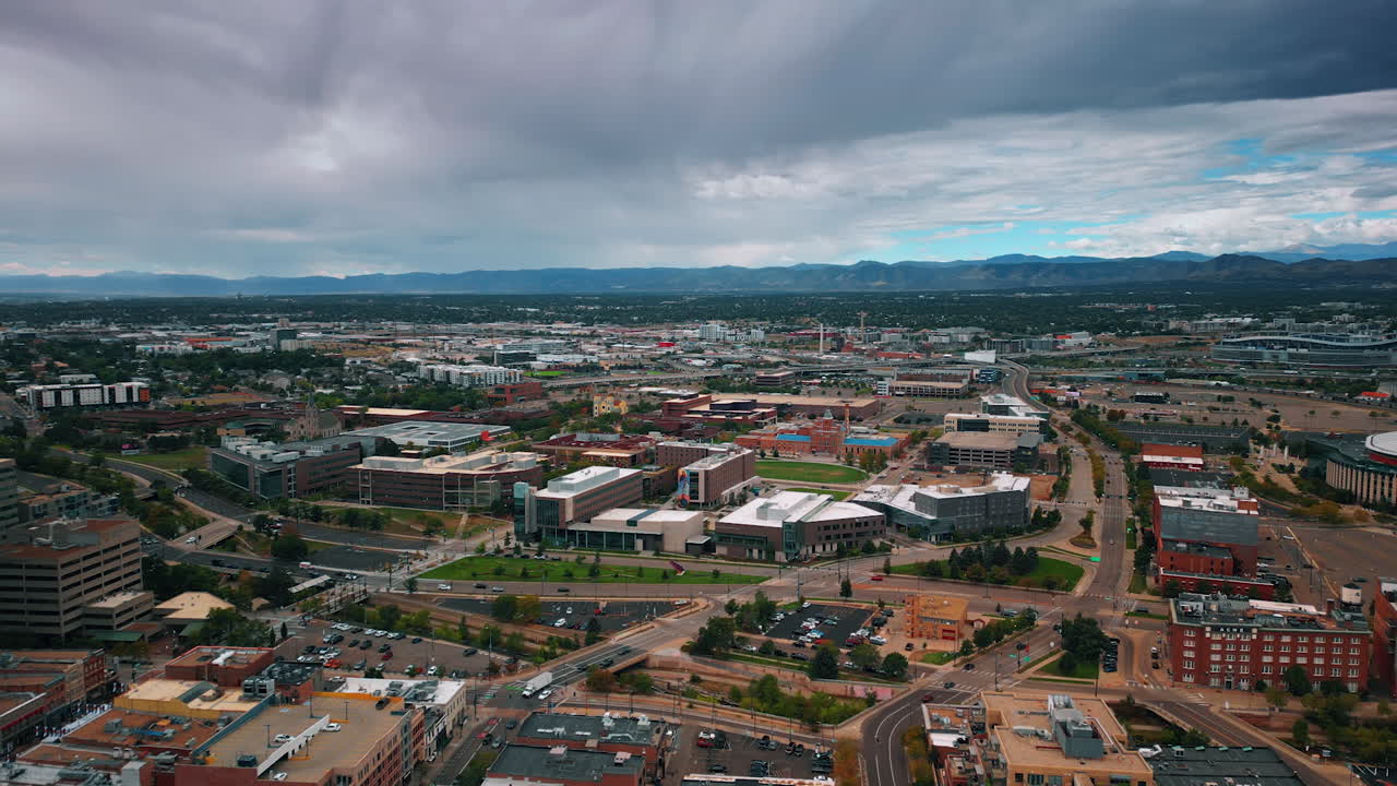 Denver, USA, 28 July 2025: Vast urban area from drone on a gloomy day. Dark dramatic cloudscape covering the sky over the city. Denver, Colorado, USA