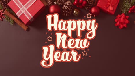 Animation-of-happy-new-year-greetings-text-over-christmas-presents-and-decorations