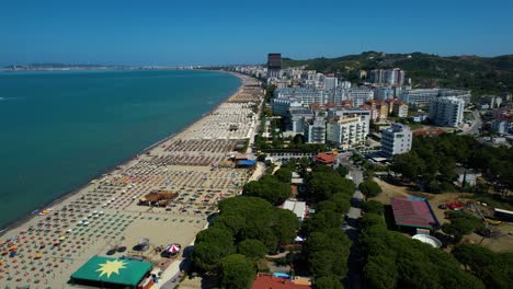 Health-friendly-beach-with-iodized-sand-near-green-pines-and-Adriatic-sea,-hotels,-and-resorts-for-booking-in-Durres,-Albania