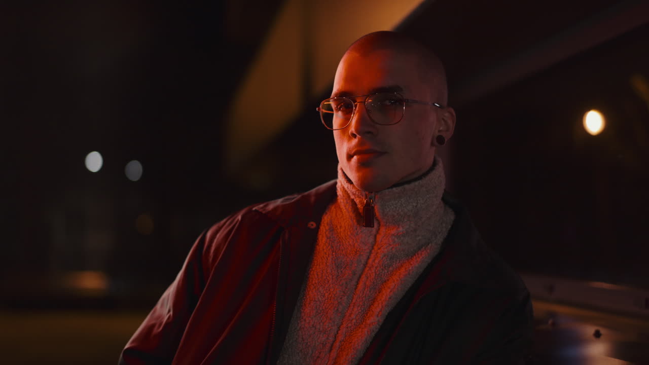 Night Portrait of a Man Under Red Light