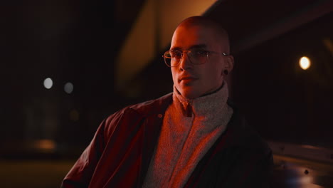night portrait of a man under red light