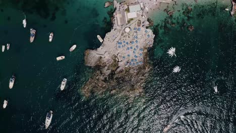 Rising-aerial-view-of-a-unique-resort-shoreline-in-Italy