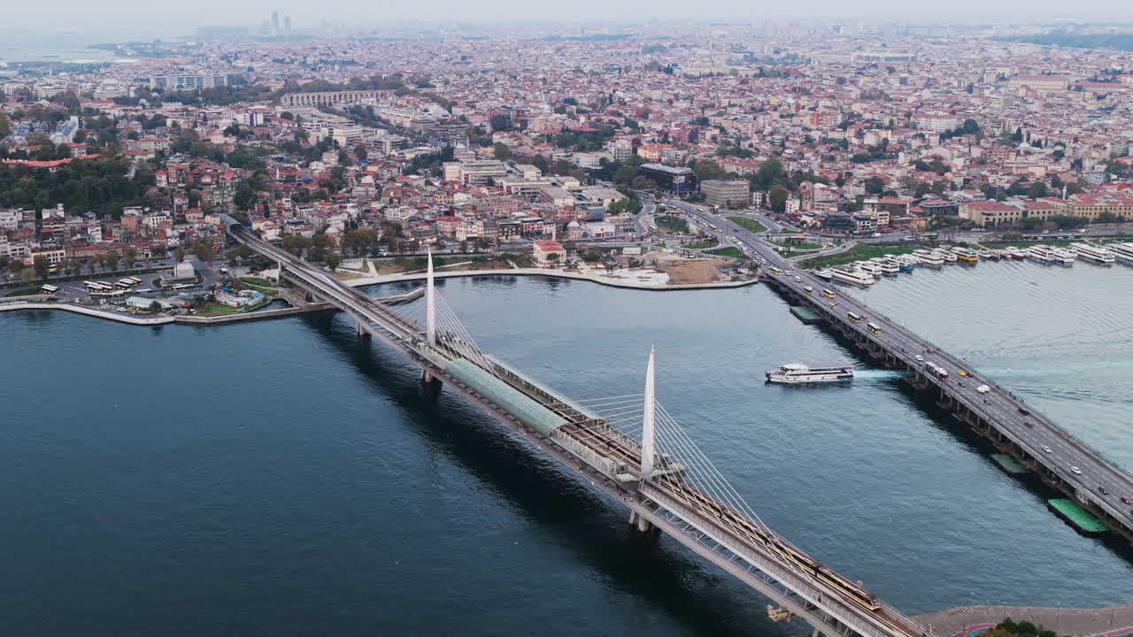 Bridge spanning the Golden Horn, blending transportation, waterway views, and urban life in Istanbul’s modern landscape