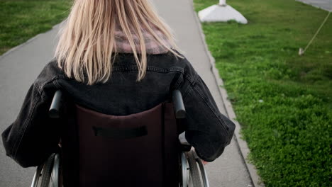 woman in wheelchair outdoors