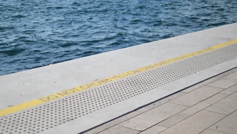 do not cross yellow line at the dock