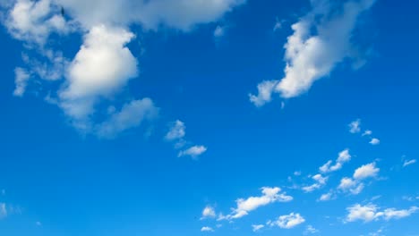 clouds are moving in the blue sky. timelapse