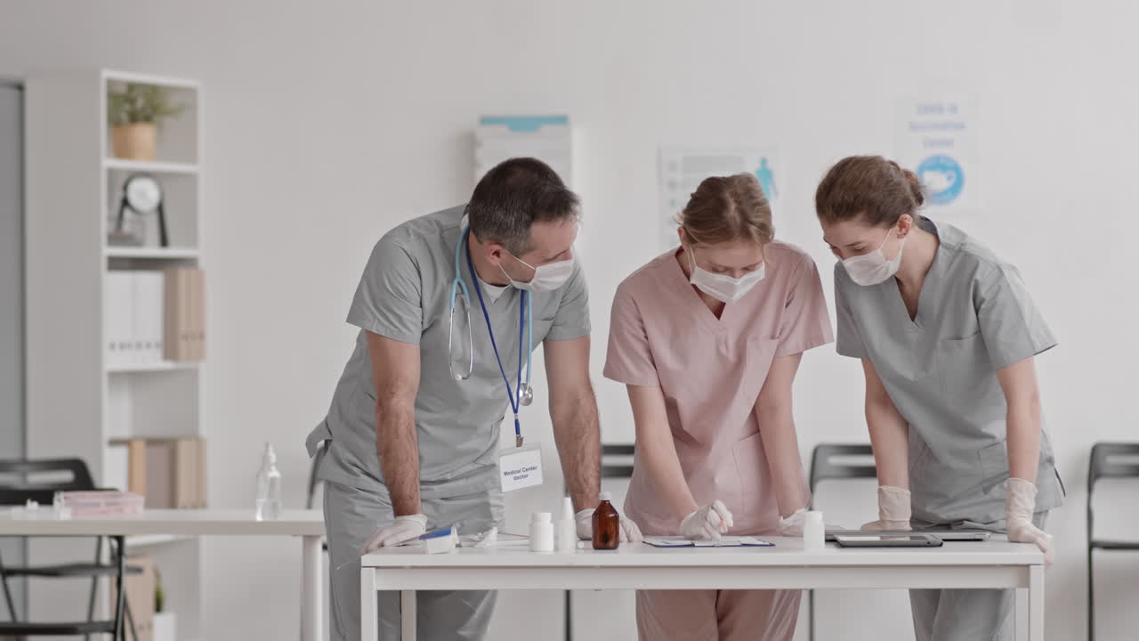 Three Doctors Talking Before Working Day