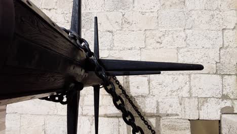 Close-up-View-Of-The-Chain-Winch-Mechanism-At-The-Gate-Of-Torre-de-Belem-In-Lisbon,-Portugal