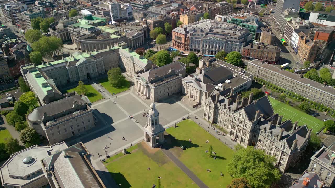 Left-to-right travelling aerial video of the campus and surrounding areas of Trinity College in Dublin, Ireland on a sunny day. Filmed in 4K, 60FPS and with Rec709 color.
