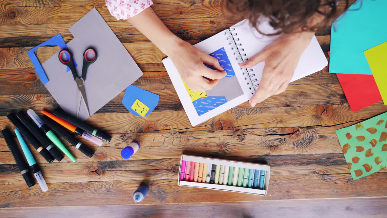 Creative Person Making a Paper Collage