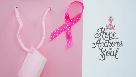 Animation-of-breast-cancer-awareness-text-over-pink-breast-cancer-ribbon