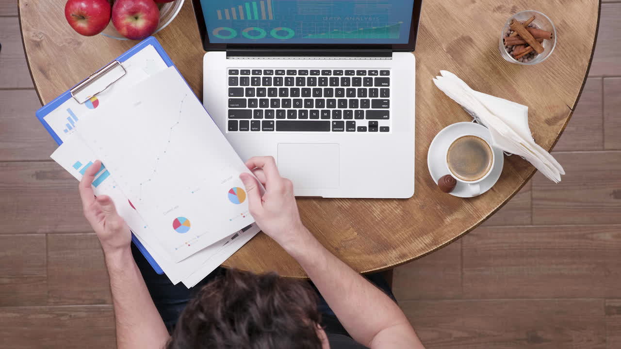 Working on data analysis with coffee and apples