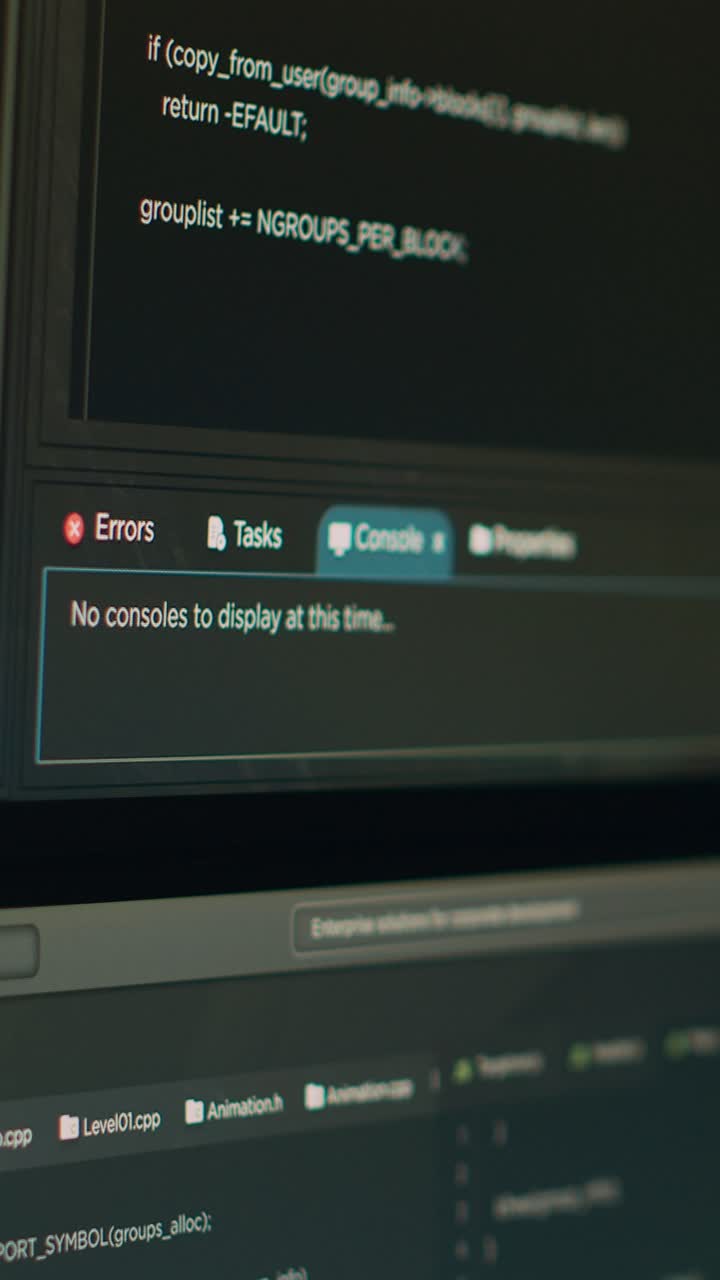 Vertical video: Computer screen of software developer typing programming language