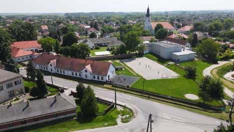 Aerial-View-of-Szalkszentmarton,-Hungary-with-Church-and-Community-Buildings