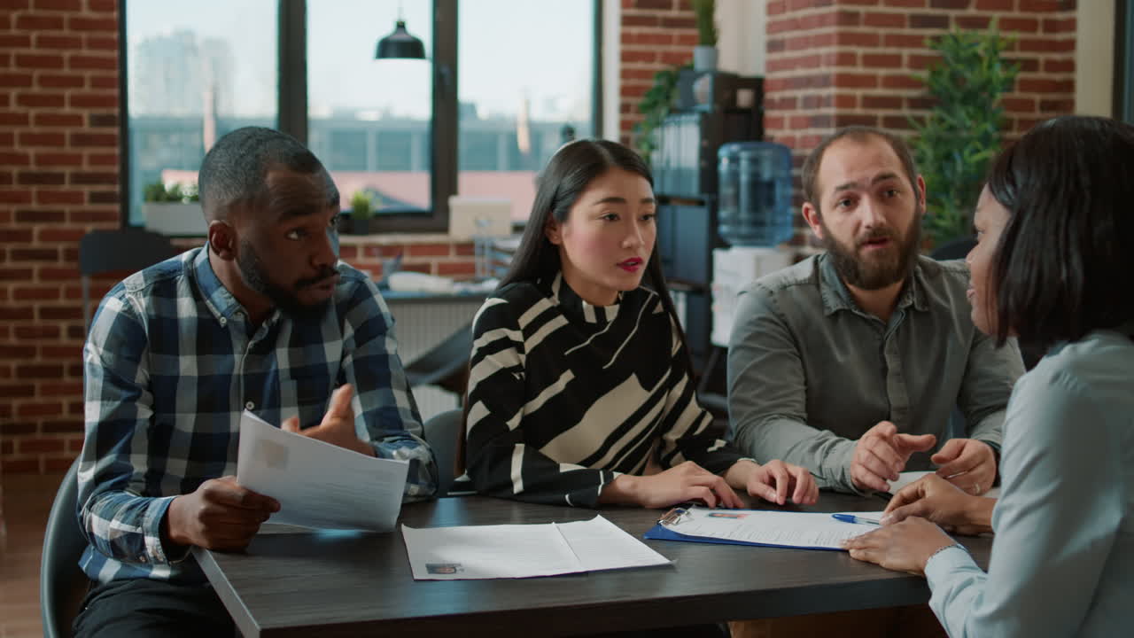 Female applicant being rejected from company job at interview meeting