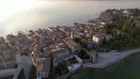 Aerial-view-Sirmione-mediteranean-historical-sightseeing-town-in-italy-on-lake-garda